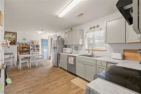 Kitchen - 715 Cherry St, Waldron, AR 72958 photo 2 of 3