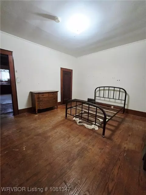 Bedroom - 313 W Main St, Paris, AR 72855 photo 2 of 4