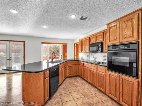Kitchen - 103 E George Ave, Pocola, OK 74902 photo 2 of 3