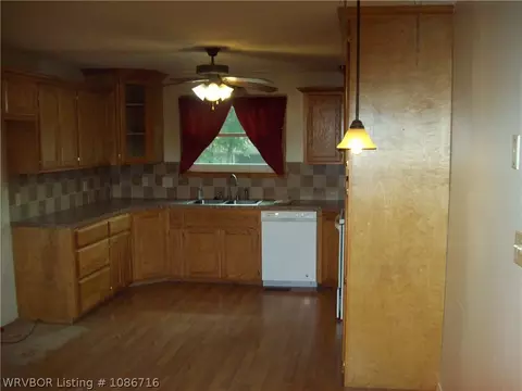 Kitchen - 705 N 18th St, Ozark, AR 72949 photo 1 of 2