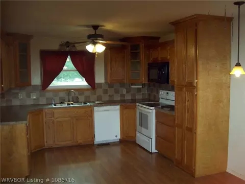 Kitchen - 705 N 18th St, Ozark, AR 72949 photo 2 of 2