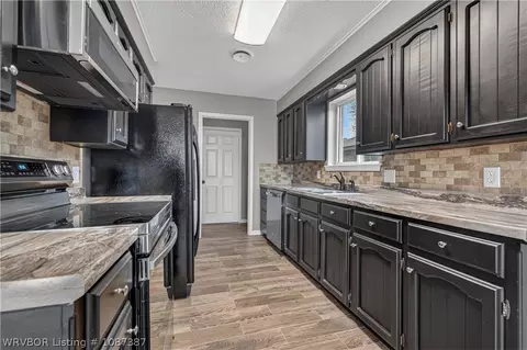 Kitchen - 504 M St, Barling, AR 72923 photo 2 of 4
