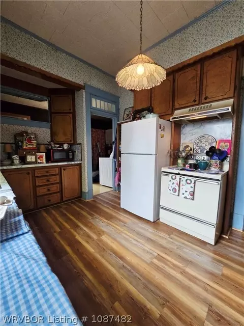 Kitchen - 707 E Walnut St, Paris, AR 72855 photo 2 of 2