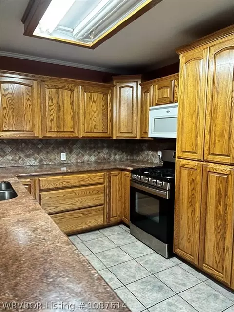 Kitchen - 118 Hall St, Paris, AR 72855 photo 1 of 7