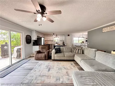 Living - 8811 Sebastian Ct, Hackett, AR 72937 photo 6 of 10