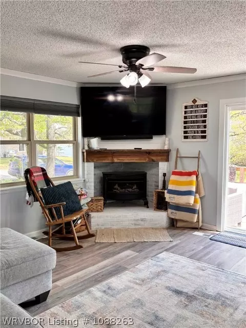 Living - 8811 Sebastian Ct, Hackett, AR 72937 photo 2 of 10