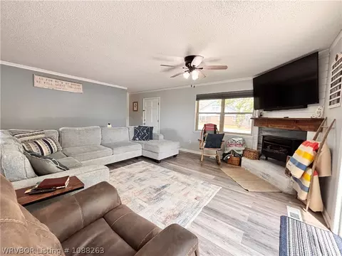 Living - 8811 Sebastian Ct, Hackett, AR 72937 photo 9 of 10