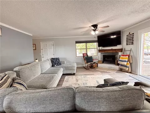 Living - 8811 Sebastian Ct, Hackett, AR 72937 photo 3 of 10