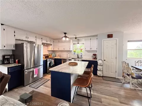Kitchen - 8811 Sebastian Ct, Hackett, AR 72937 photo 7 of 10