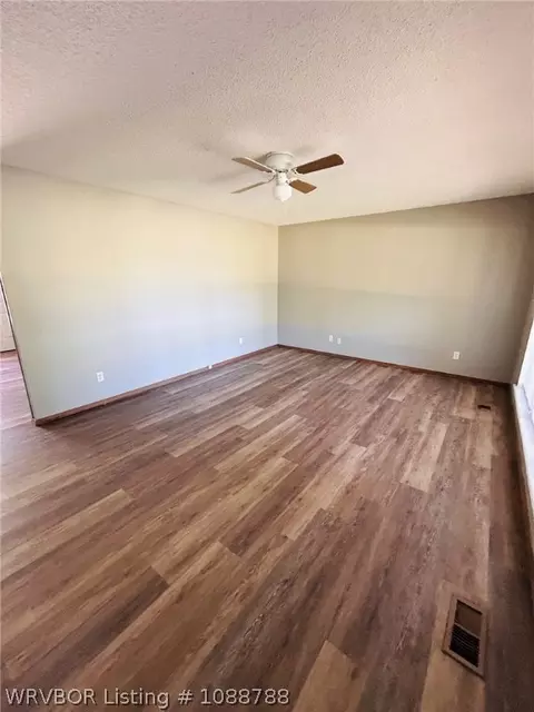Living - 1305 Bugscuffle Rd, Lavaca, AR 72941 photo 2 of 2