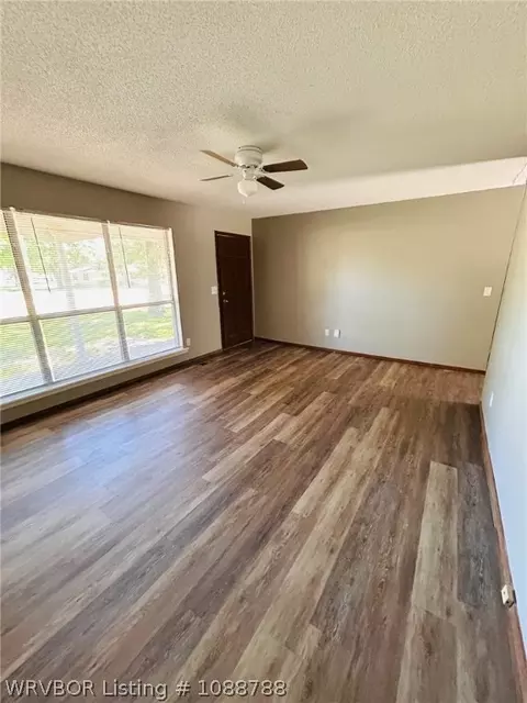 Living - 1305 Bugscuffle Rd, Lavaca, AR 72941 photo 1 of 2