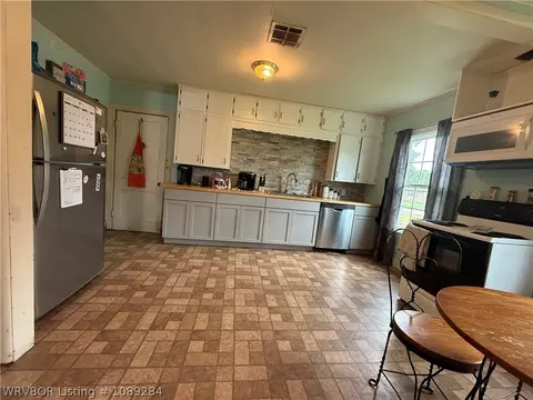 Kitchen - 505 Chism St, Paris, AR 72855 photo 2 of 3
