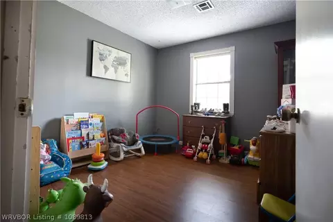 Bedroom - 506 S Kcs Rd, Gans, OK 74936 photo 6 of 6