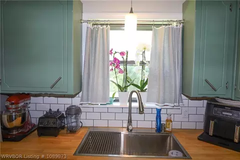 Kitchen - 300 N 4th St, Lavaca, AR 72941 photo 2 of 2