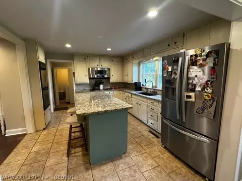 Kitchen - 404 Nixon Rd, Lavaca, AR 72941 photo 7 of 9