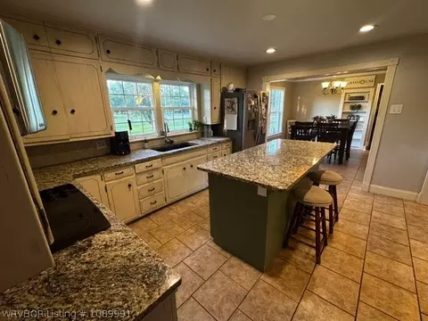 Kitchen - 404 Nixon Rd, Lavaca, AR 72941 photo 3 of 9