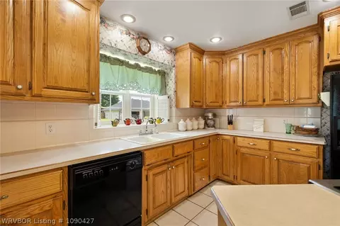 Kitchen - 310 N 28th St, Ozark, AR 72949 photo 2 of 3