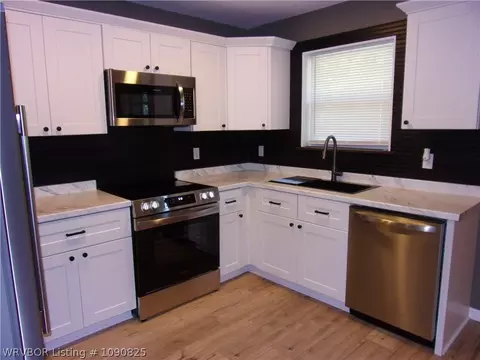 Kitchen - 313 S 29th St, Ozark, AR 72949 photo 2 of 2