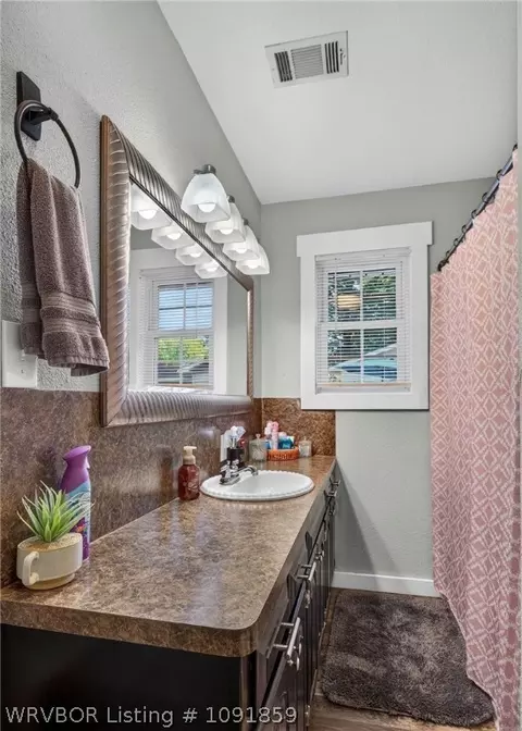 Bath - 610 E Arch St, Paris, AR 72855 photo 1 of 2