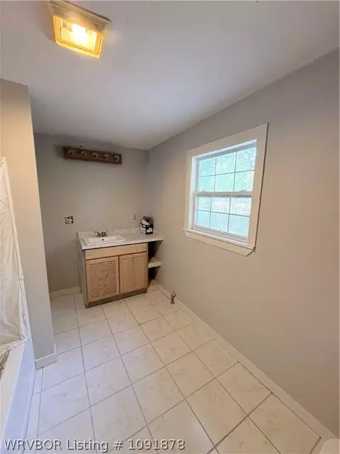 Bath - 320 S Ash St, Spiro, OK 74959 photo 1 of 2