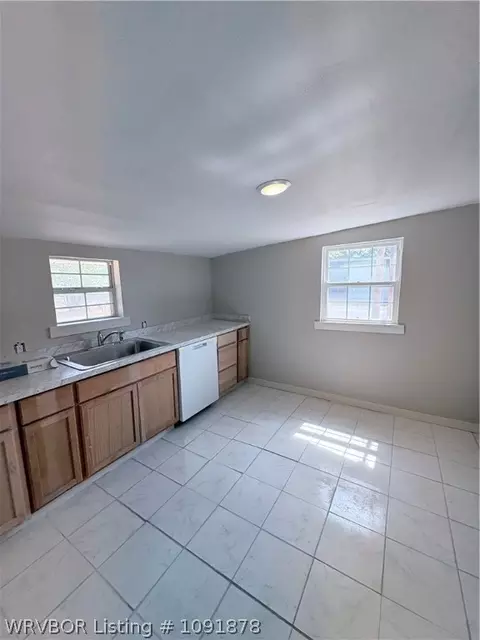 Kitchen - 320 S Ash St, Spiro, OK 74959 photo 2 of 2
