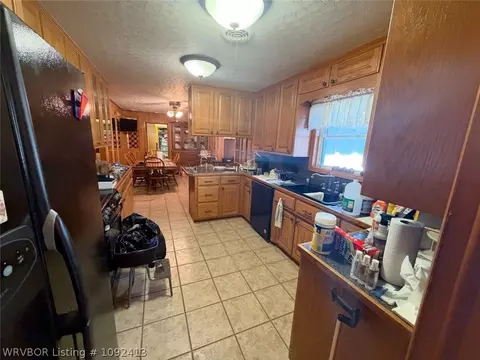 Kitchen - 403 Chism St, Paris, AR 72855 photo 2 of 3