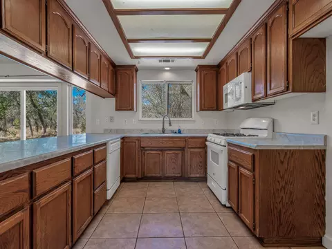 Kitchen - 27178 Dersch Rd, Shingletown, CA 96088 photo 3 of 4