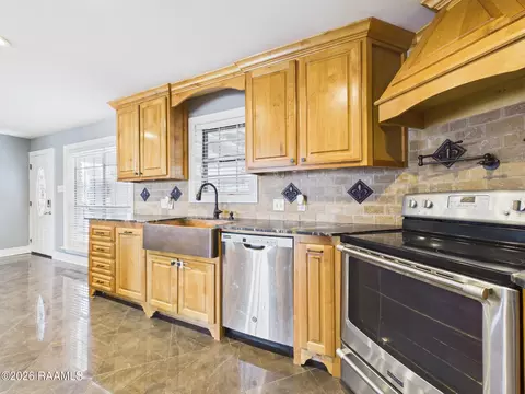 Kitchen - 312 S Fieldspan Rd, Scott, LA 70583 photo 6 of 7