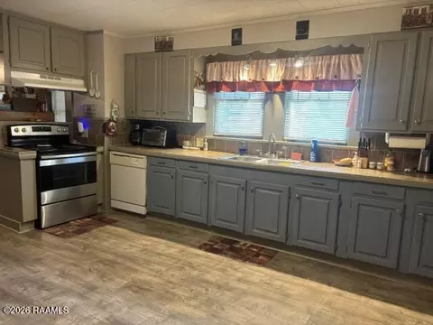 Kitchen - 400 W Oak Ave, Eunice, LA 70535 photo 2 of 2