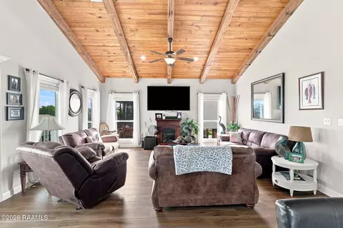 Living - 221 Pierce Mitchell Rd, Hackberry, LA 70645 photo 1 of 2