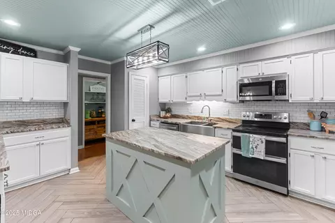 Kitchen - 316 Arena Rd, Perry, GA 31069 photo 8 of 9