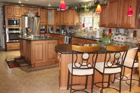 Kitchen - 635 NE 2nd St, Cedaredge, CO 81413 photo 3 of 4