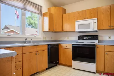 Kitchen - 401 Grand Ave #E, Delta, CO 81416 photo 1 of 2