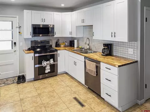 Kitchen - 717 E 3rd St, Cortez, CO 81321 photo 1 of 3