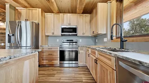 Kitchen - 573 Crest Dr, Cimarron, CO 81220 photo 2 of 4