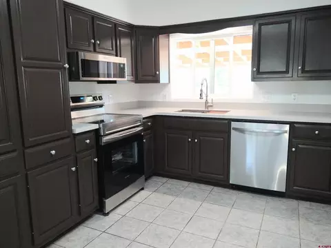 Kitchen - 231 E 3rd St, Cortez, CO 81321 photo 1 of 3