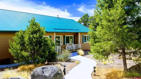 Exterior - 21166 Rustic Rd, Cedaredge, CO 81413 photo 1 of 13
