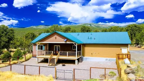 Exterior - 21166 Rustic Rd, Cedaredge, CO 81413 photo 3 of 13