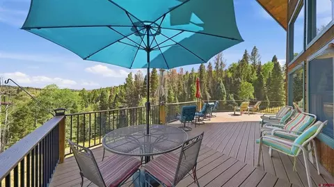 Exterior - 702 Crest Dr, Cimarron, CO 81220 photo 4 of 13