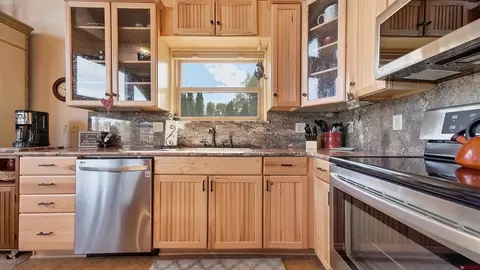 Kitchen - 702 Crest Dr, Cimarron, CO 81220 photo 4 of 5