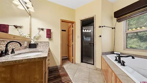 Bath - 702 Crest Dr, Cimarron, CO 81220 photo 2 of 4