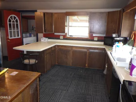Kitchen - 313 6th St E, Culbertson, MT 59218 photo 3 of 8