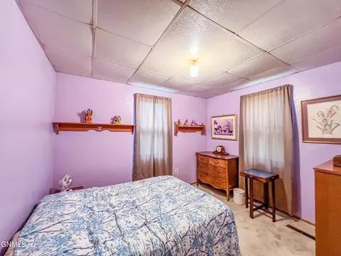 Bedroom - 106 3rd Ave, Luverne, ND 58056 photo 3 of 4