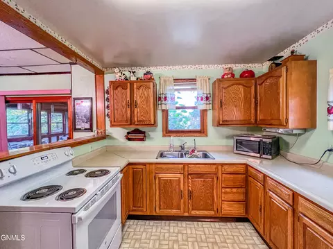 Kitchen - 106 3rd Ave, Luverne, ND 58056 photo 2 of 3