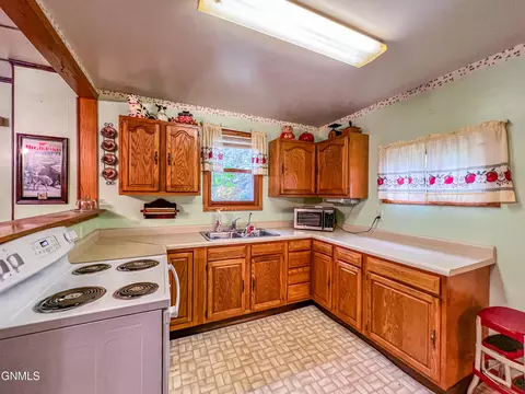 Kitchen - 106 3rd Ave, Luverne, ND 58056 photo 3 of 3