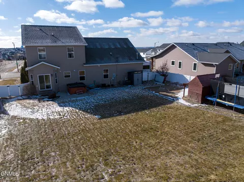 Exterior - 1420 Talon Rd, Bismarck, ND 58503 photo 5 of 9