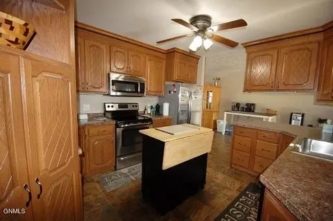 Kitchen - 808 9th St SW, Sidney, MT 59270 photo 1 of 4