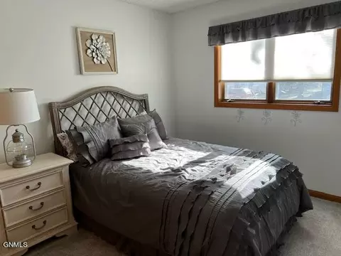 Bedroom - 702 6th St SE, Sidney, MT 59270 photo 3 of 4
