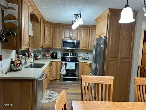 Kitchen - 702 6th St SE, Sidney, MT 59270 photo 1 of 2