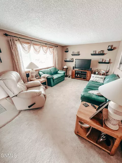 Living - 2322 17th Cir W, Williston, ND 58801 photo 2 of 3